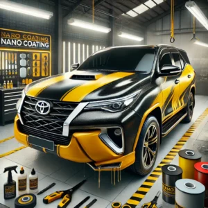 Toyota Fortuner sedang menjalani proses nano coating di workshop modern Bandung.