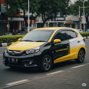 Proses aplikasi Nano Ceramic pada body Honda Brio oleh teknisi profesional